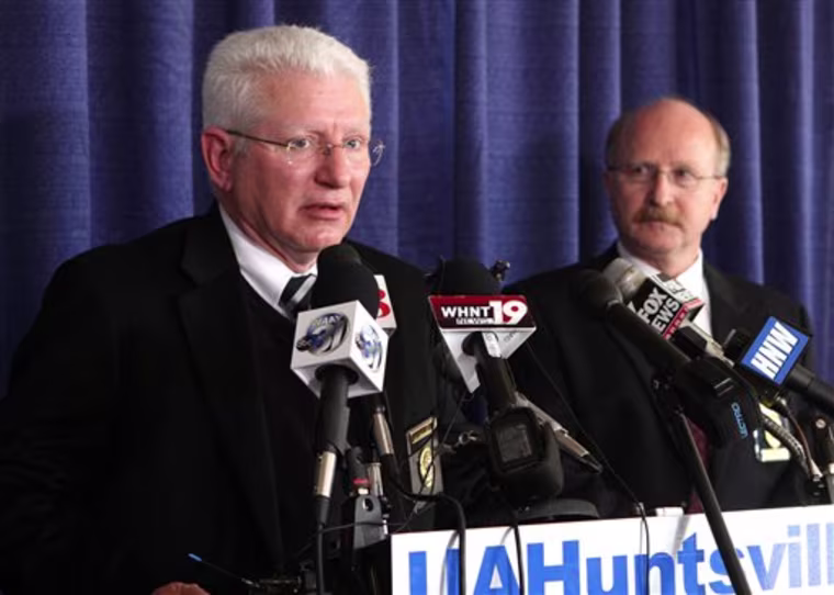 Chuck Gailes, chief of campus police at the University of Alabama at Huntsville, answers questions during a news conference on Saturday, Feb. 13, 2010, in Huntsville, Ala. University spokesman Ray Garner said Saturday that the professor, Amy Bishop, had been informed months ago that she would not be granted tenure. He said the faculty meeting where she is accused of gunning down colleagues was not called to discuss tenure. (AP Photo/ Butch Dill)